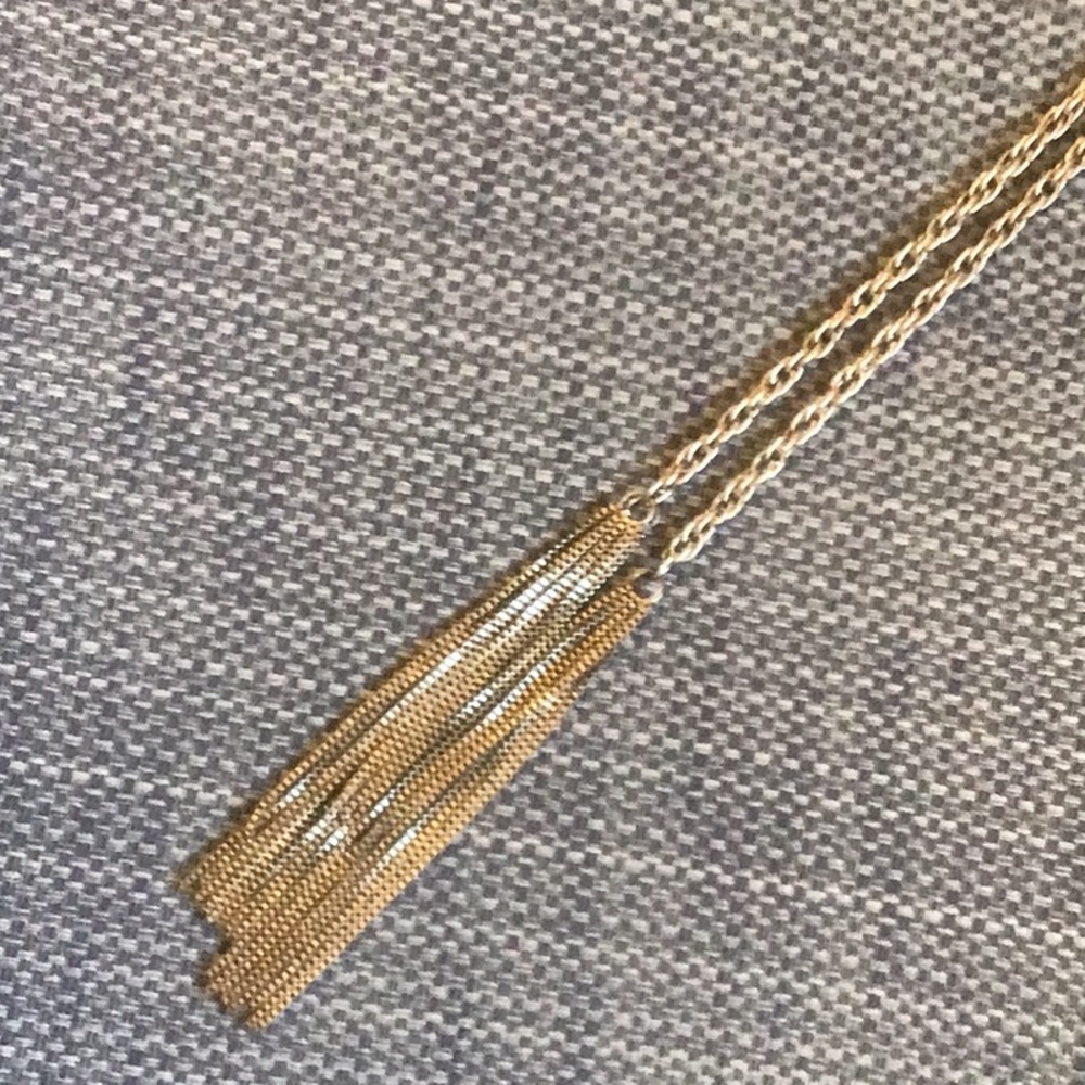 Silver tone tassel chain belt. Can  be worn as a necklace Very good condition
